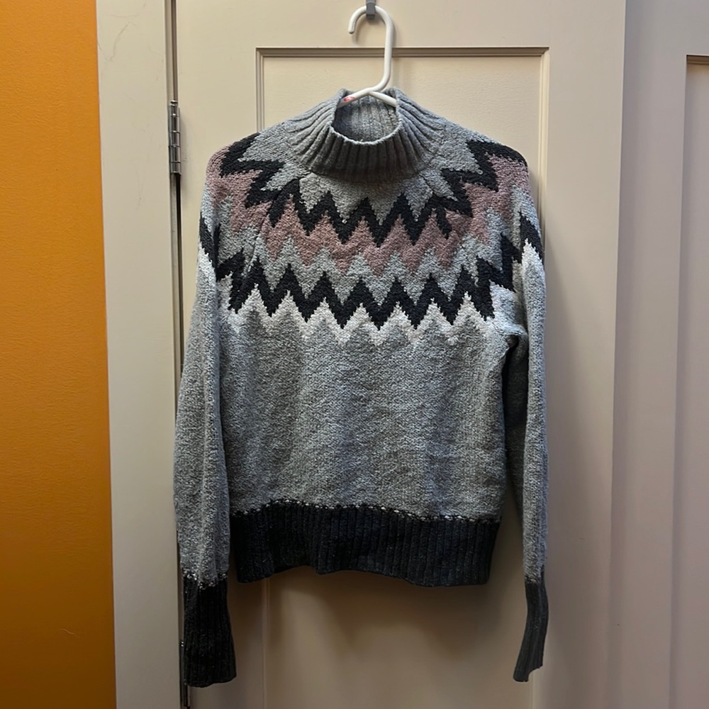 Cute, stretchy, fair isle style sweater.